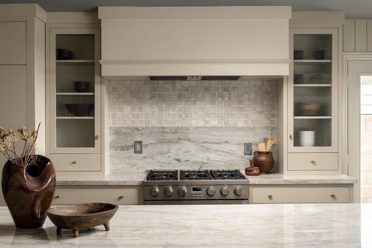 Kitchen with plaster range hood